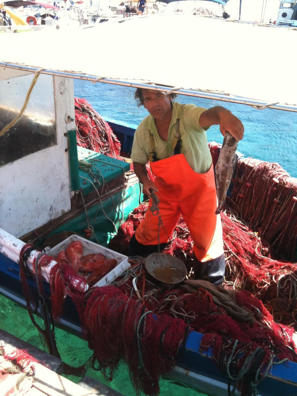 Fishermen in Sardinia selling their catch