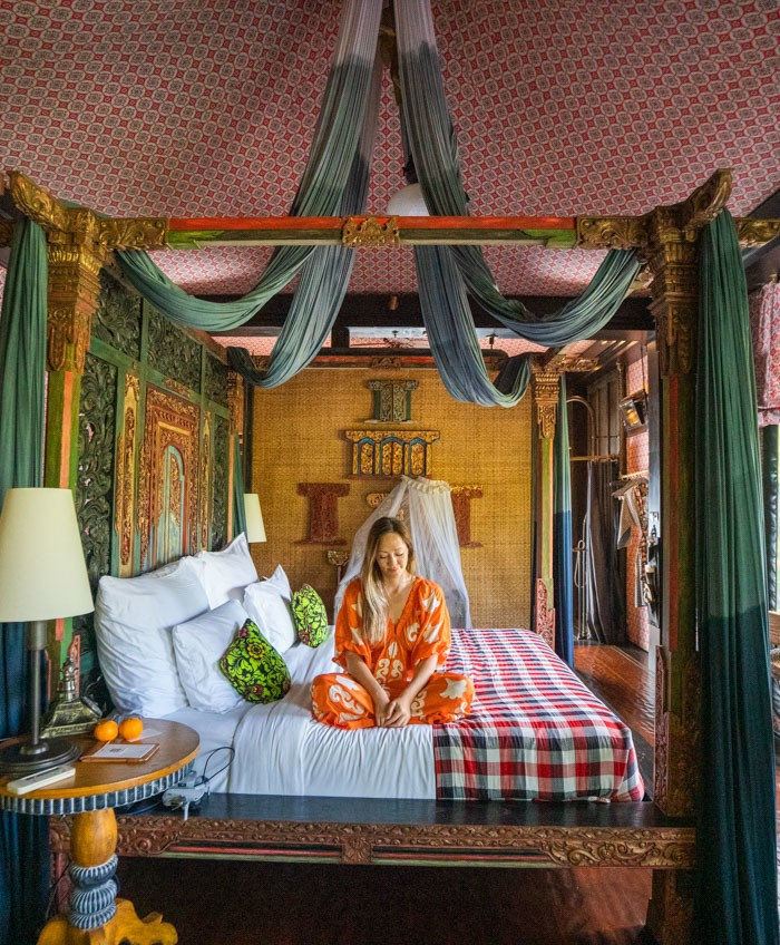 Luxury hotel nestled in Ubud, Bali, surrounded by lush greenery