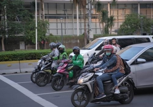 car behind motorcycle