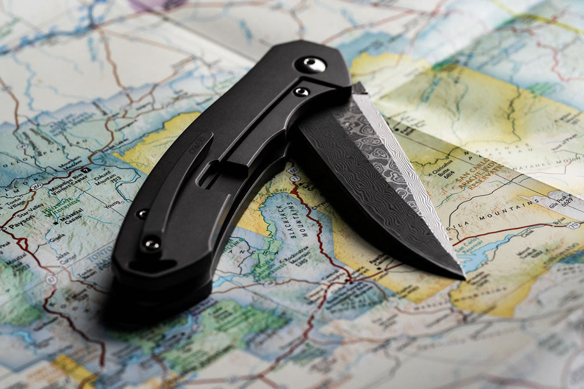 carved damascus pocket