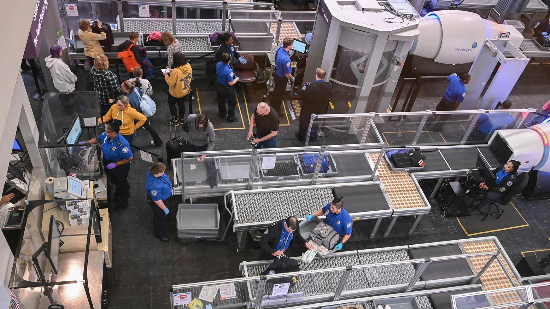 TSA agent at work during a government shutdown, ensuring security checks continue