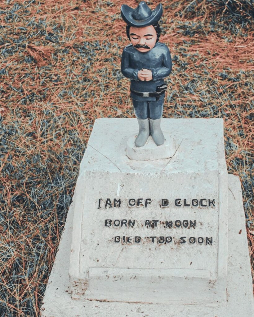 Unique tombstones at the Cemetery of Negativism in Camp John Hay, encouraging visitors to reflect and let go of negative emotions