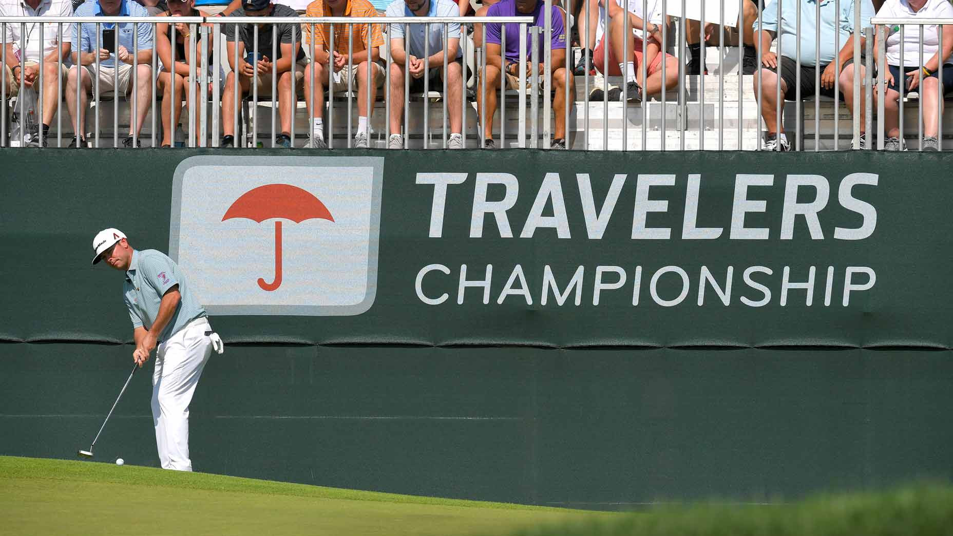 Chez Reavie celebrates his victory at the Travelers Championship, capturing the essence of golfing triumph and competition