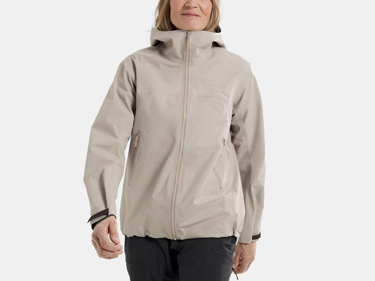 Woman wearing beige rain jacket