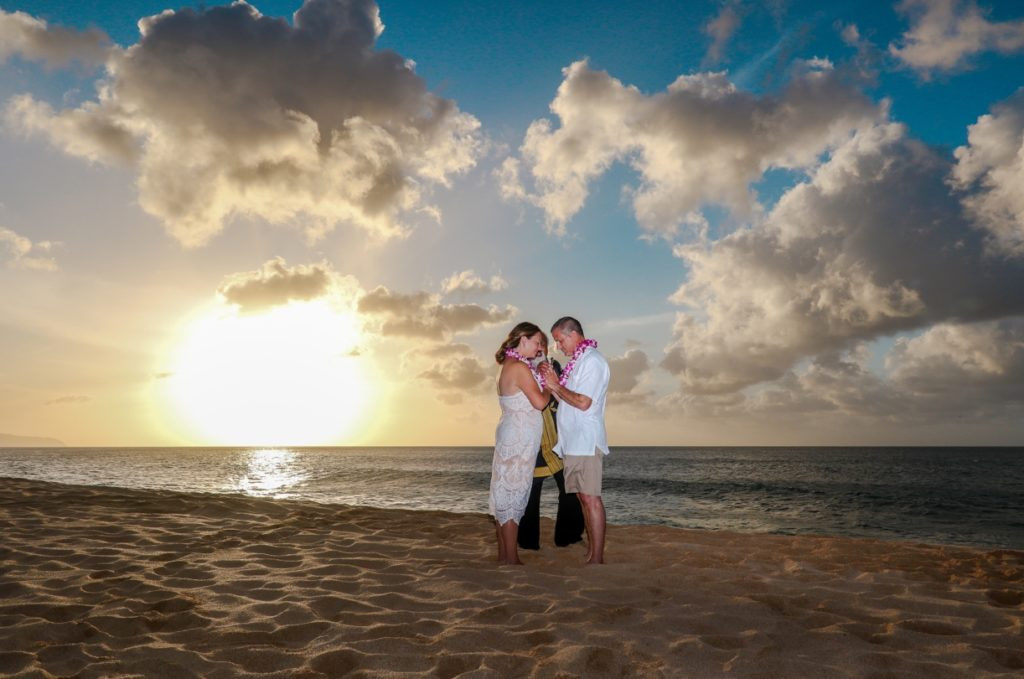 Hawaiian couple sharing Aloha spirit, celebrating the end of travel restrictions