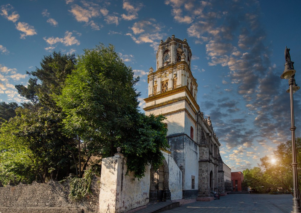 An empty street in Coyoacan, Mexico, showcasing the vibrant neighborhoods and cultural charm.