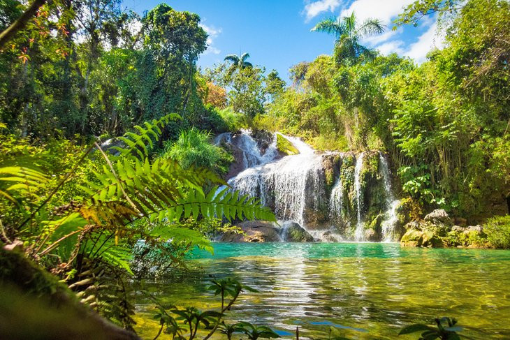 Poceta de Cristal in El Nicho National Park, Cuba, showcasing the clear waters and lush surroundings
