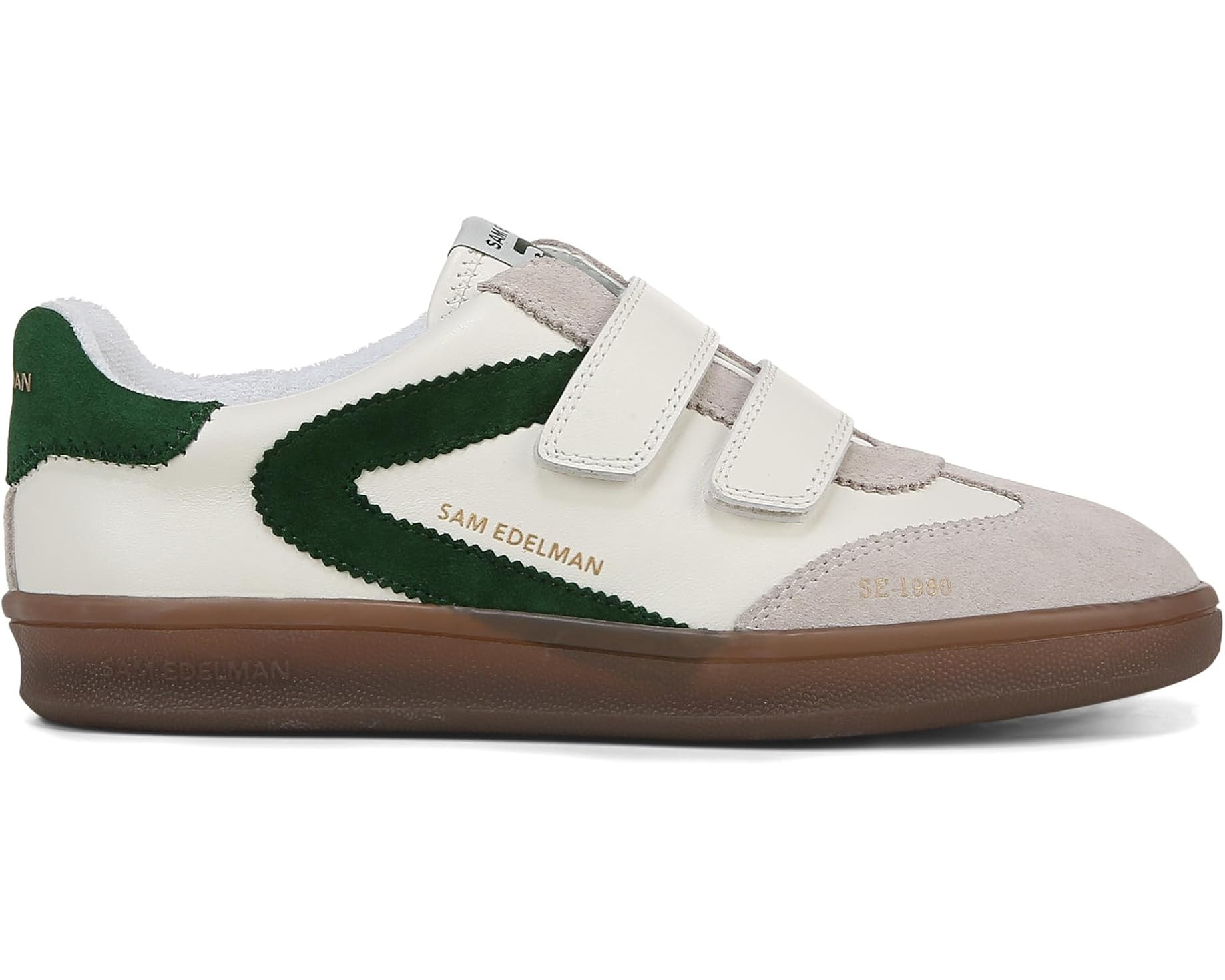 Stylish dark green and white slip-on sneakers for women, offering convenience and comfort