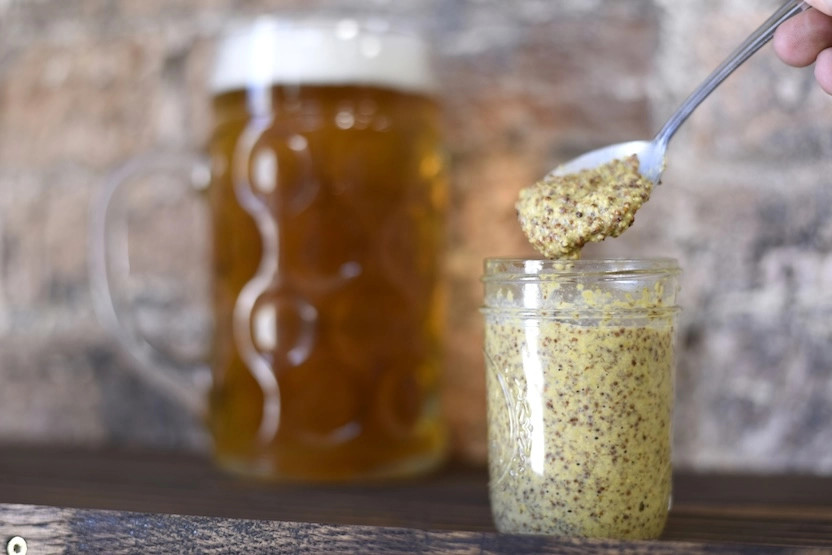 Whole-grain dijon mustard in a jar. 