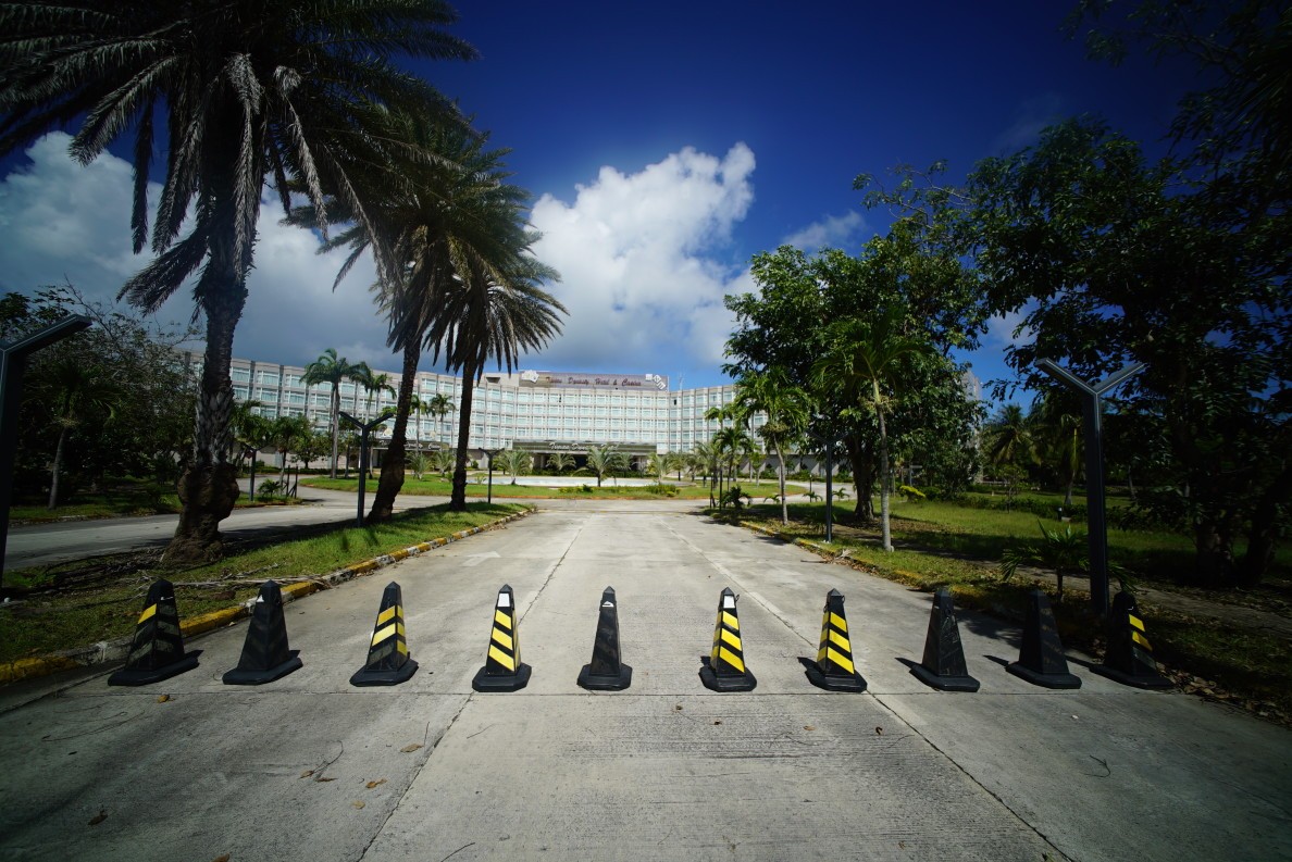 The road to the Tinian Dynasty on Tinian is blocked off after owners declared bankruptcy and shut down the hotel and casino. 