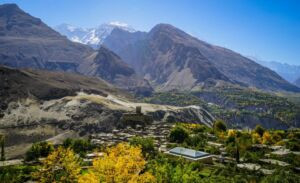 Panoramic view of Altit Fort and its surrounding village, showcasing the ancient architecture and scenic beauty of Hunza Valley
