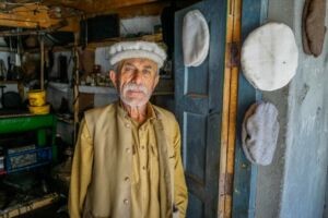 Traditional Hunza hats on display at a local market, showcasing the region's rich cultural heritage and craftsmanship