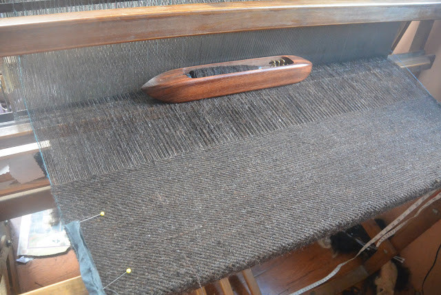 Cloak weaving in progress