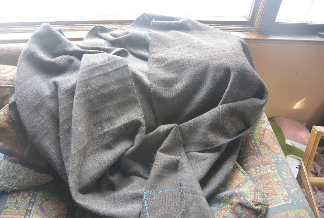 Wool cloak cut from the loom