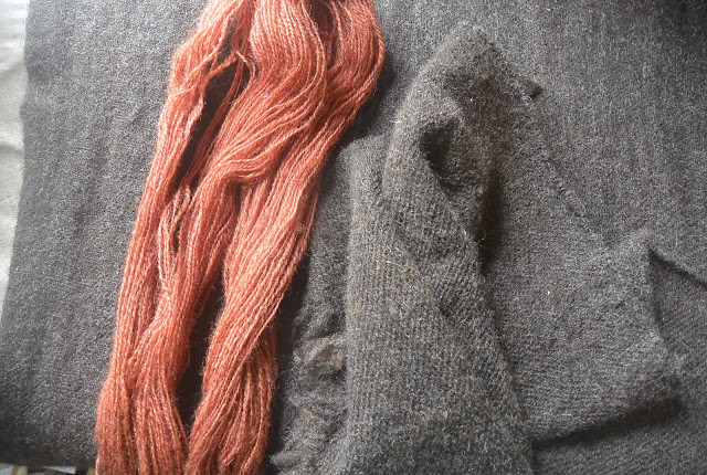 Fulled down wool cloak with shrinkage