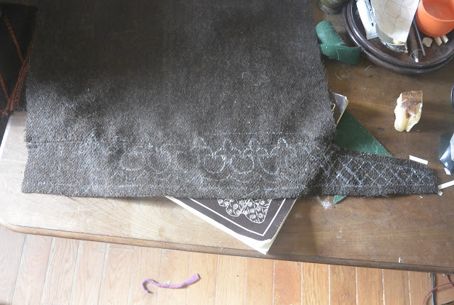 Marking the hood of the cloak