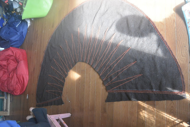 Rays all appliqued on the cloak
