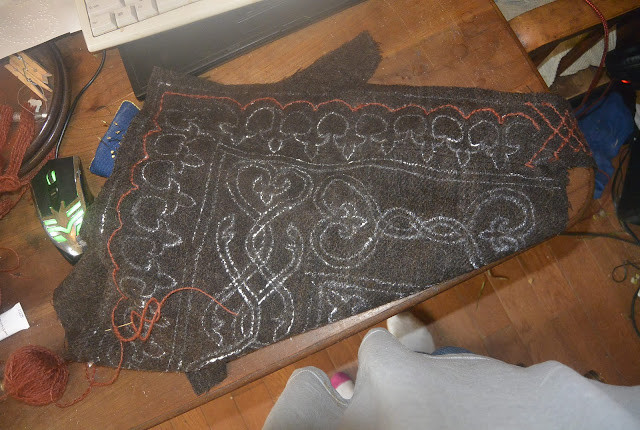 Cloak hood marked and couching in progress