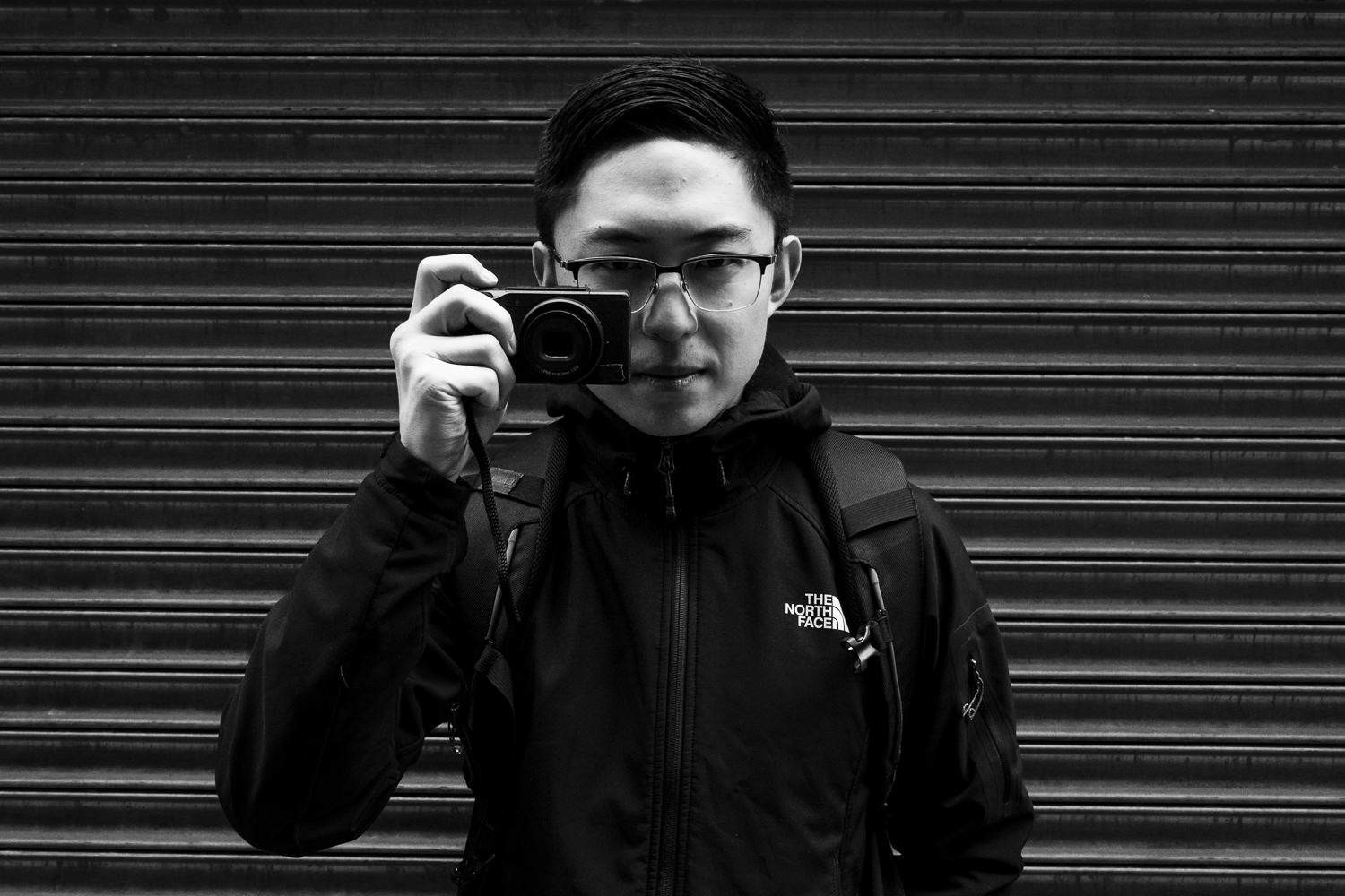 Eric Kim in Hanoi, highlighting street photography in comfortable attire