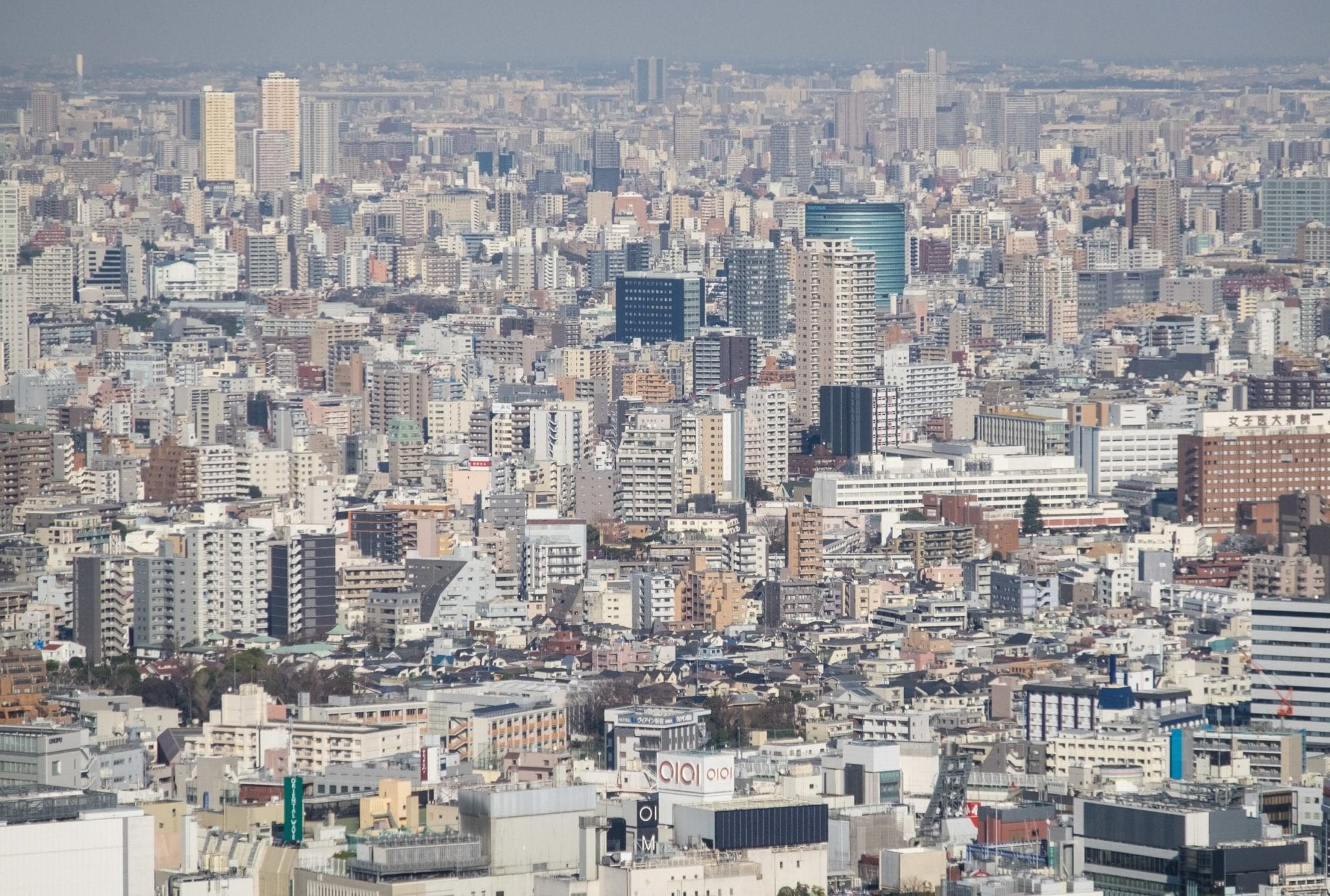 A solo female traveler confidently navigating the vibrant streets of Tokyo, showcasing the ease and safety of exploring the city