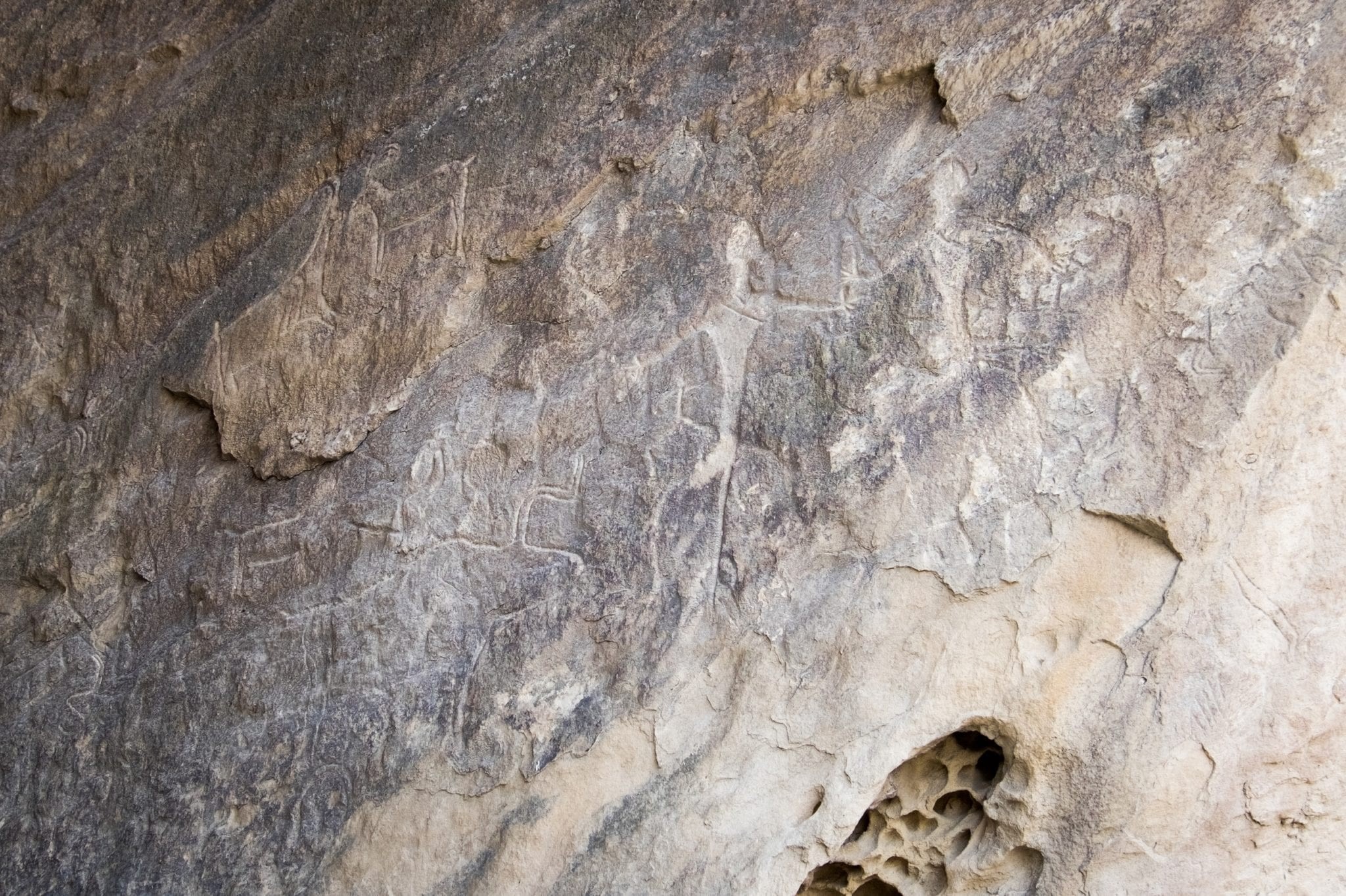 Petroglyphs in Qobustan National Park, alt text: Ancient rock carvings in Azerbaijan, historical petroglyphs