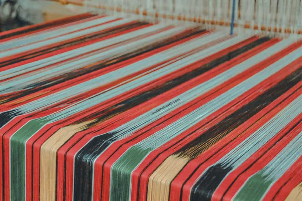 Artisans at the Easter Weaving Room in Baguio, skillfully crafting hand-woven textiles with traditional techniques