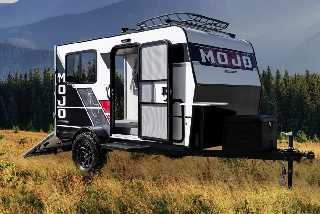 Eclipse RV Mojo travel trailer showcasing its compact, off-road capabilities with heavy-duty chassis and all-terrain tires, perfect for adventurous travelers.