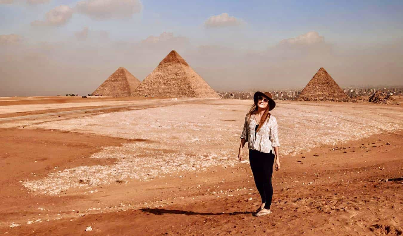 Woman looking at the pyramids
