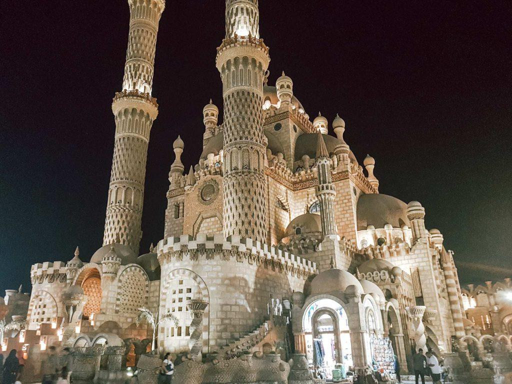 El Sahaba Mosque at night in Sharm el Sheikh, Egypt, showcasing its intricate architecture and illuminated minarets
