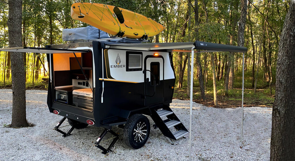 Ember RV Overland Micro featuring a compact design with outdoor kitchen and rear cargo locker options, ideal for off-road and off-grid adventures.