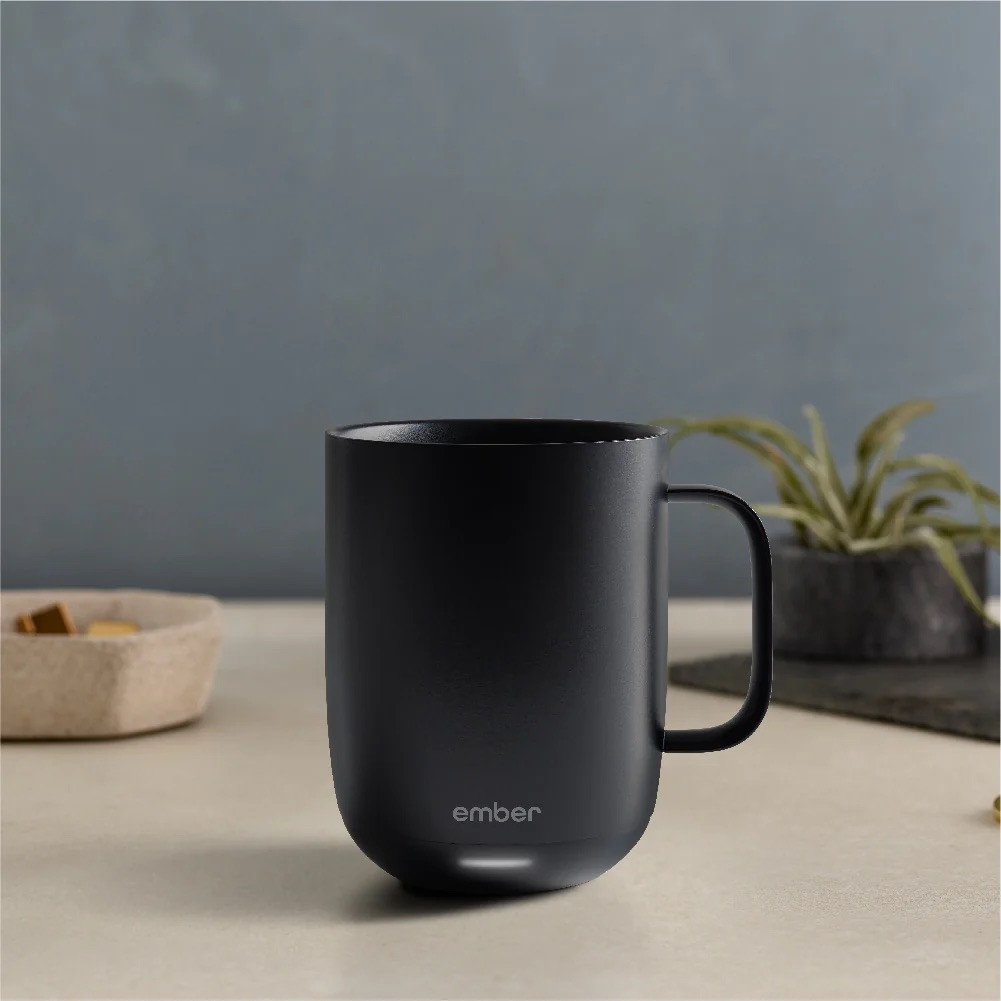 Ember Mug on a wooden table