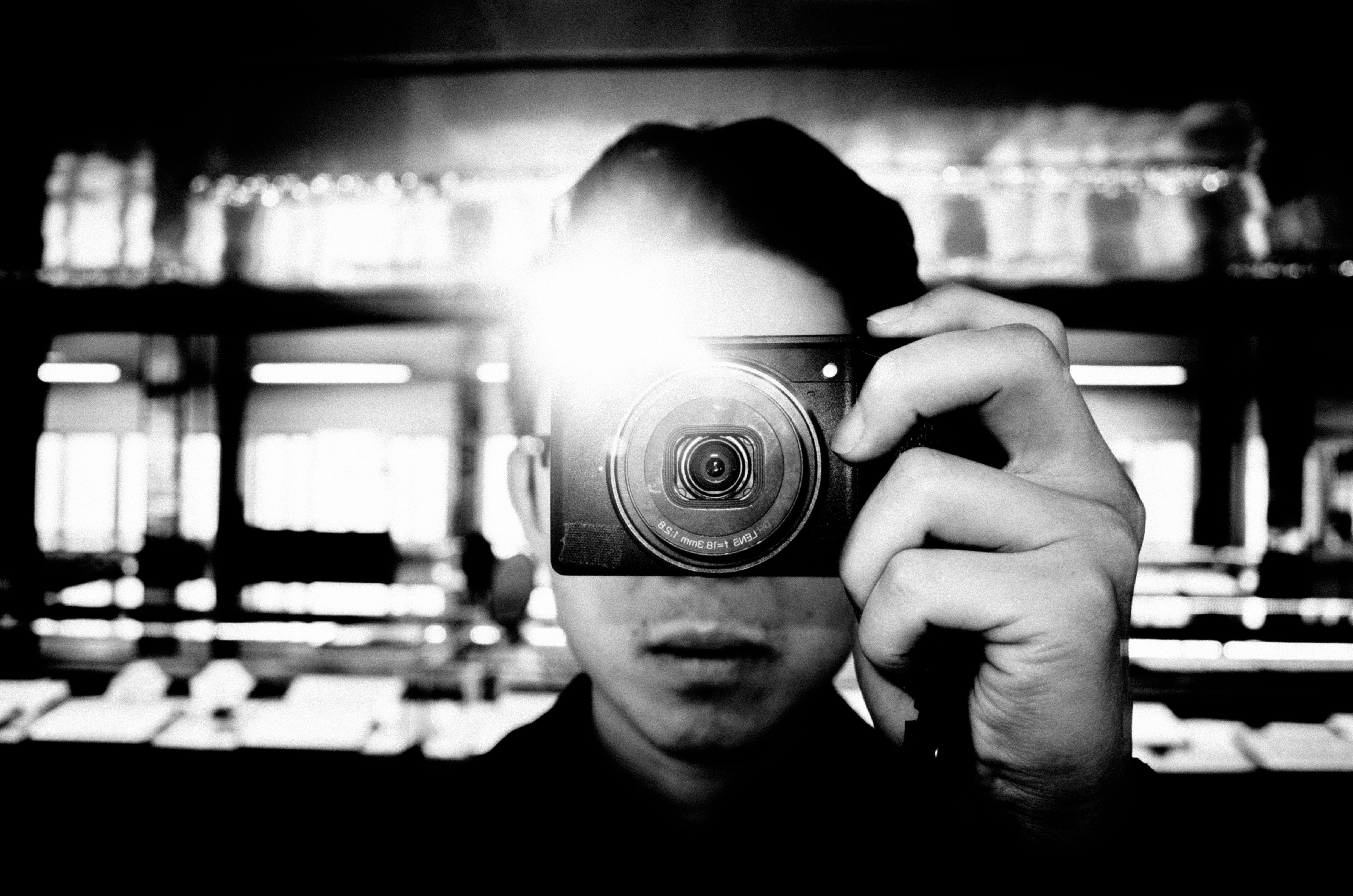 Eric Kim selfie in Hanoi, capturing the essence of street photography with a Ricoh GR II camera