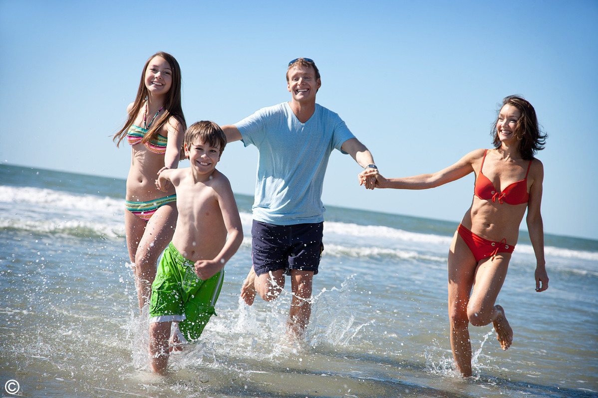 Family having fun on the beach in Myrtle Beach