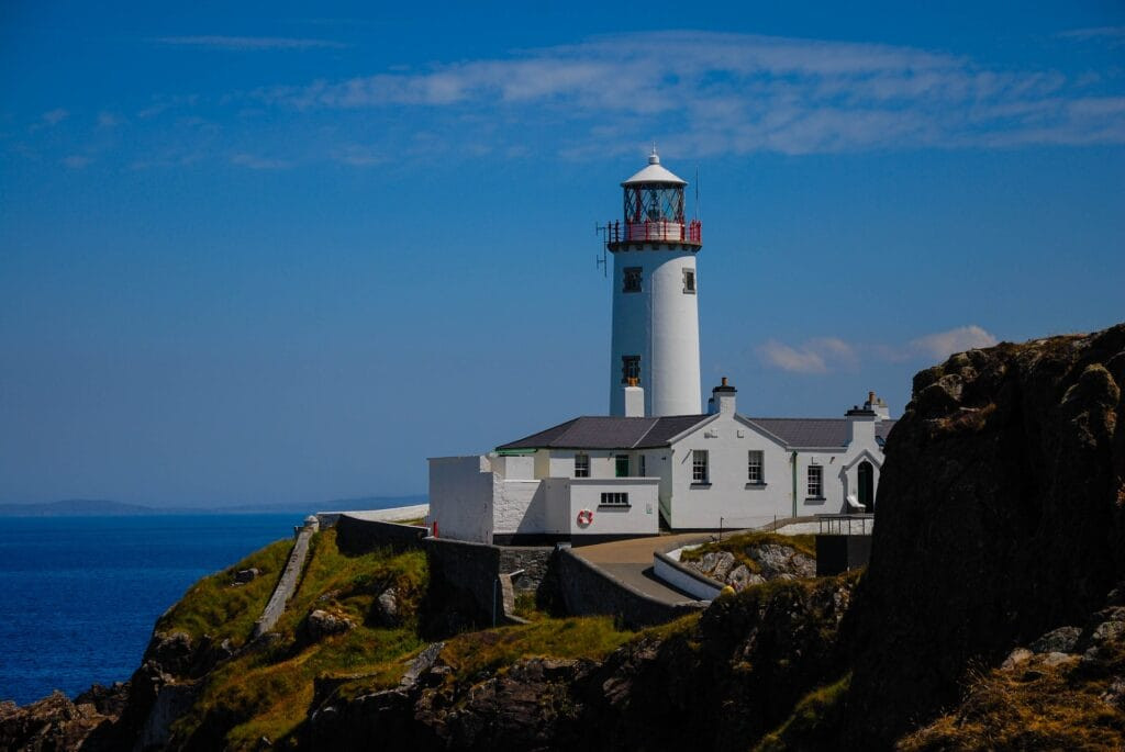 A dilapidated lighthouse requiring restoration, highlighting the preservation challenges in developing lighthouse tourism