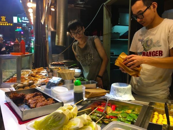 Hong Kong street food, showcasing a variety of local snacks and culinary delights