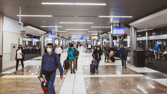 Masked Travelers at Airport