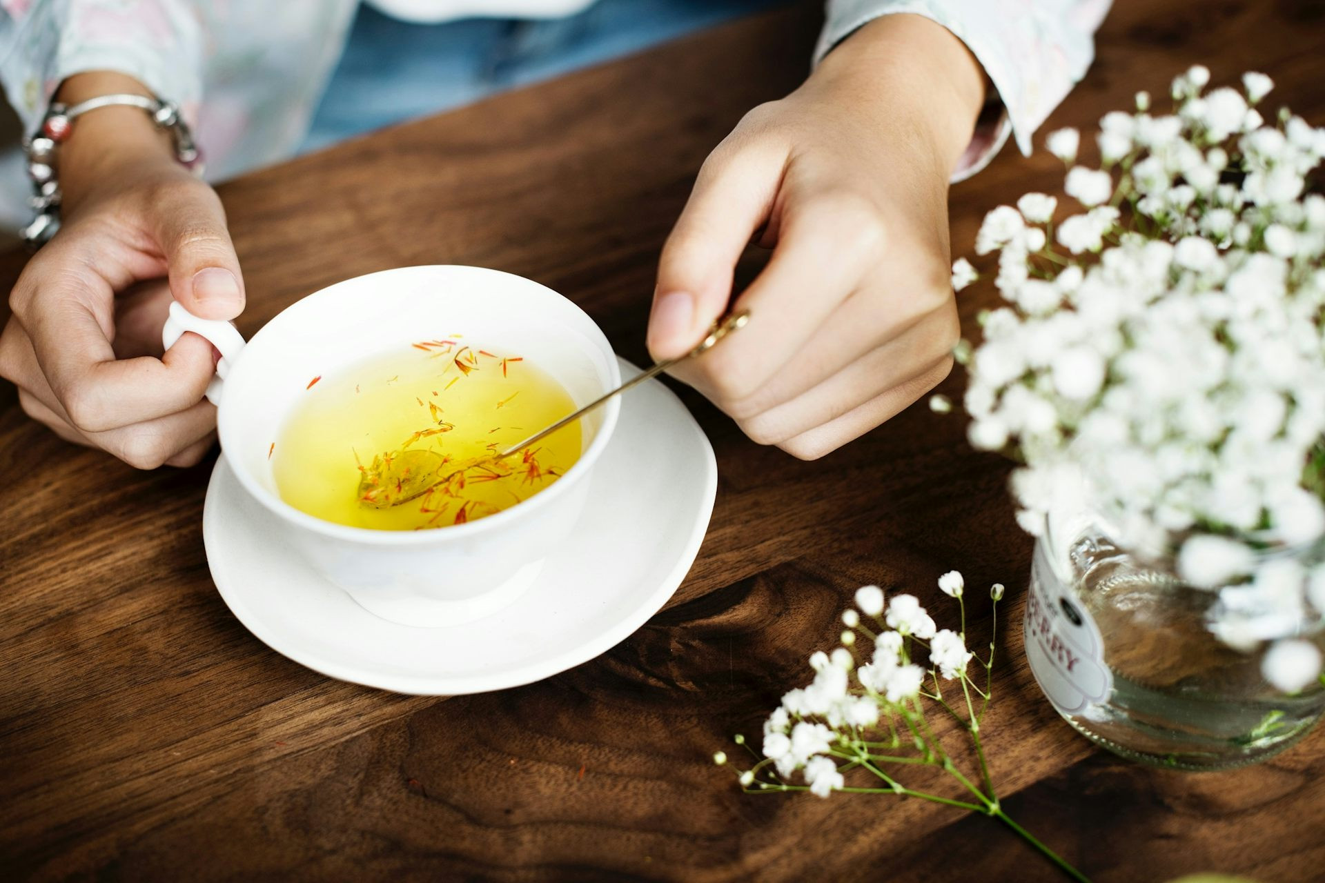 Holding a mug of hot tea