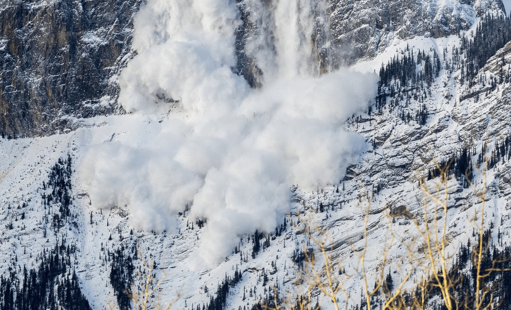 Experienced guides conducting avalanche safety training