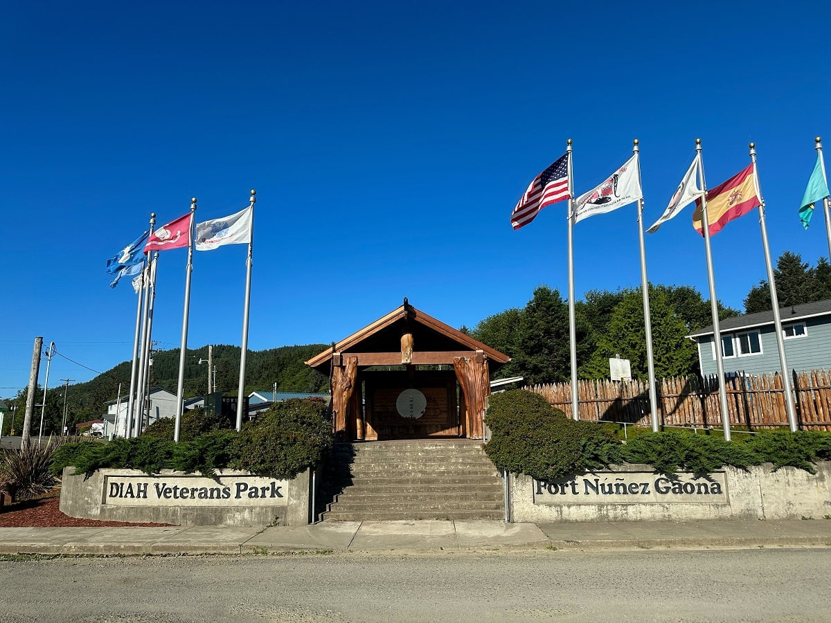 Flags waving at Fort Nunez Gaona Park in Neah Bay, highlighting regional history