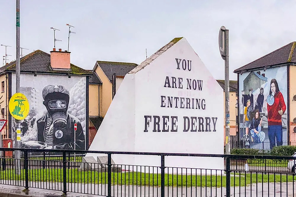 Visit Free Derry Corner and view the murals from the People's Gallery, reflecting Derry's history and resilience.