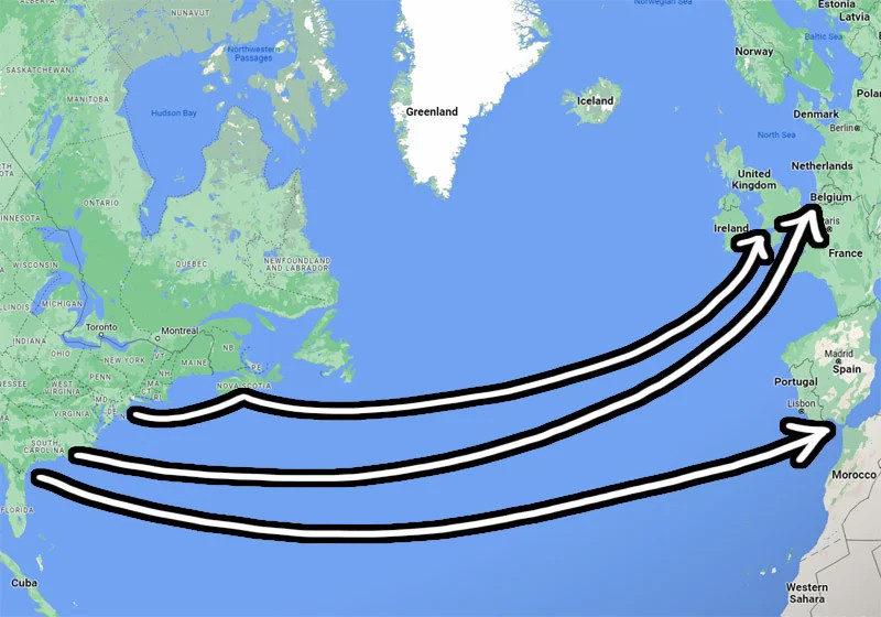 Cargo ship leaving a US port for Europe, showcasing a sustainable travel option