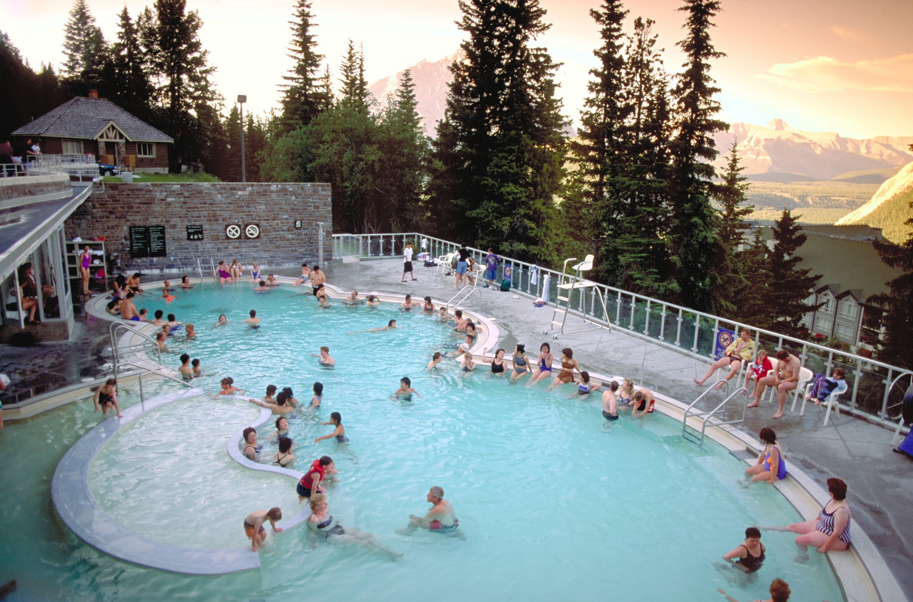 People soaking in the Banff Upper Hot Springs