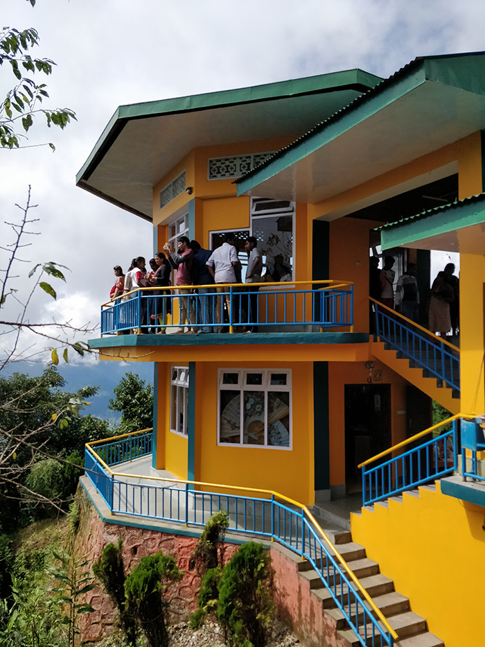 Ganesh Tok Alt Text: Captivating view from Ganesh Tok in Sikkim, featuring the scenic hills and valleys, providing a perfect spot for photography enthusiasts to capture the natural beauty.