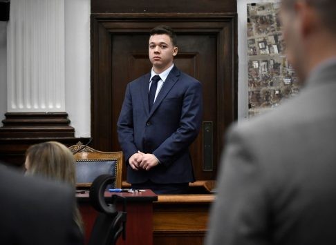 Kyle Rittenhouse waits for the jury to enter the room to continue testifying during his trial at the Kenosha County Courthouse on Nov. 10, 2021, highlighting the tension and anticipation during the proceedings.