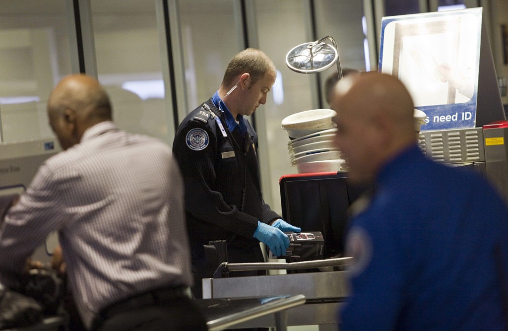 TSA PreCheck lane with passengers going through security screening