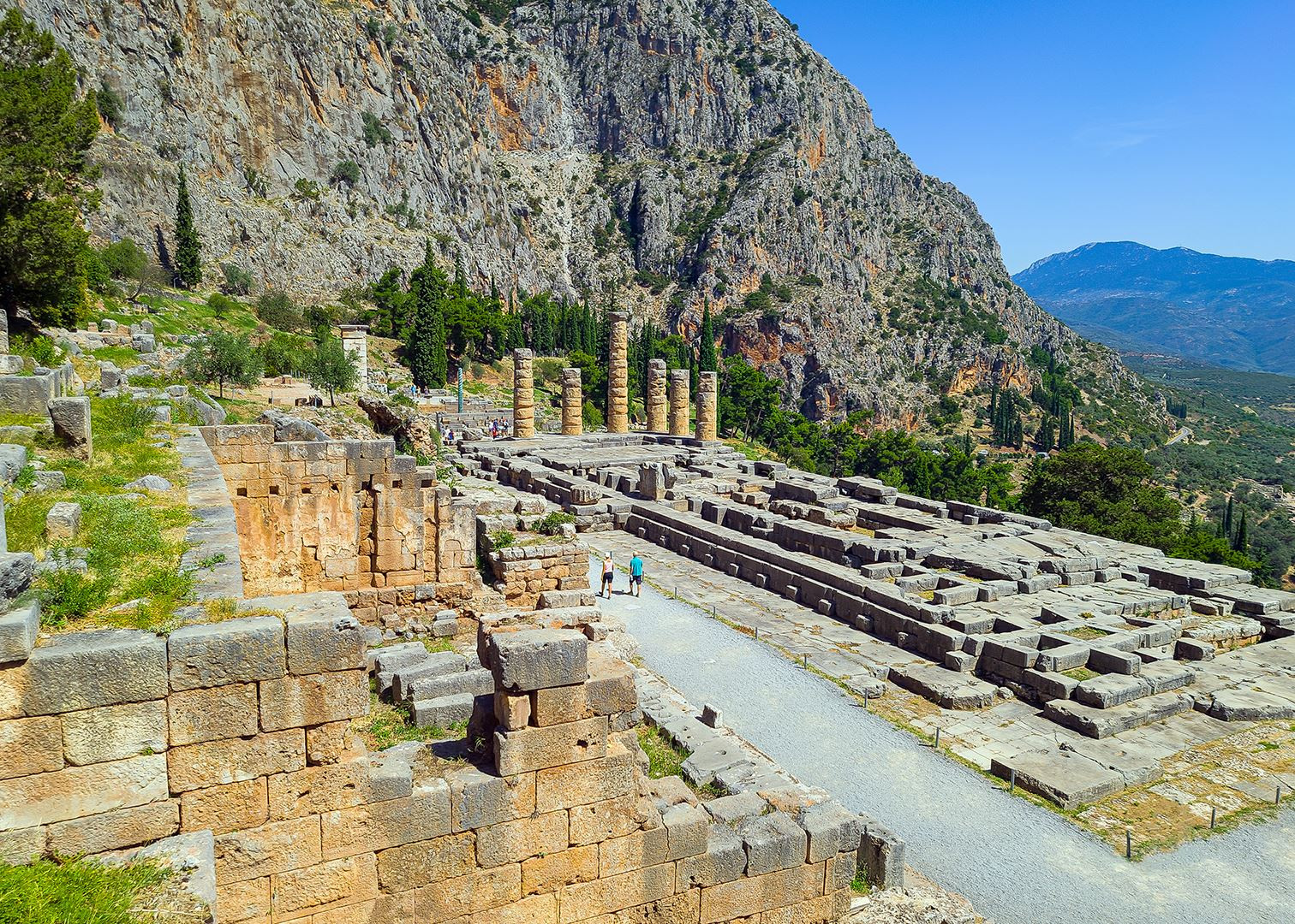 Temple of Apollo in Delphi, showcasing the ancient site's historical significance and scenic location.