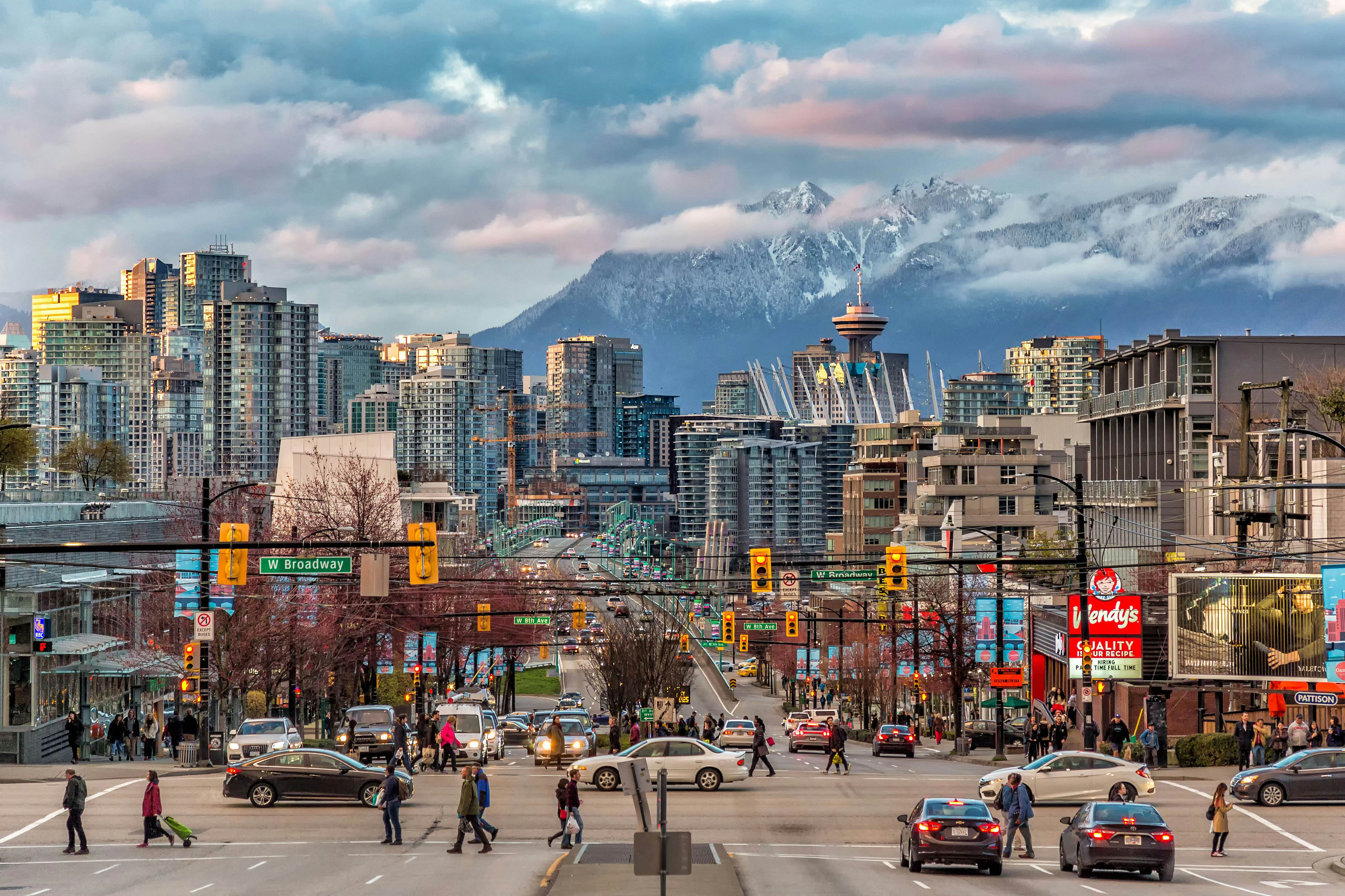 Intersection in Vancouver, BC, Canada with mountains in the background