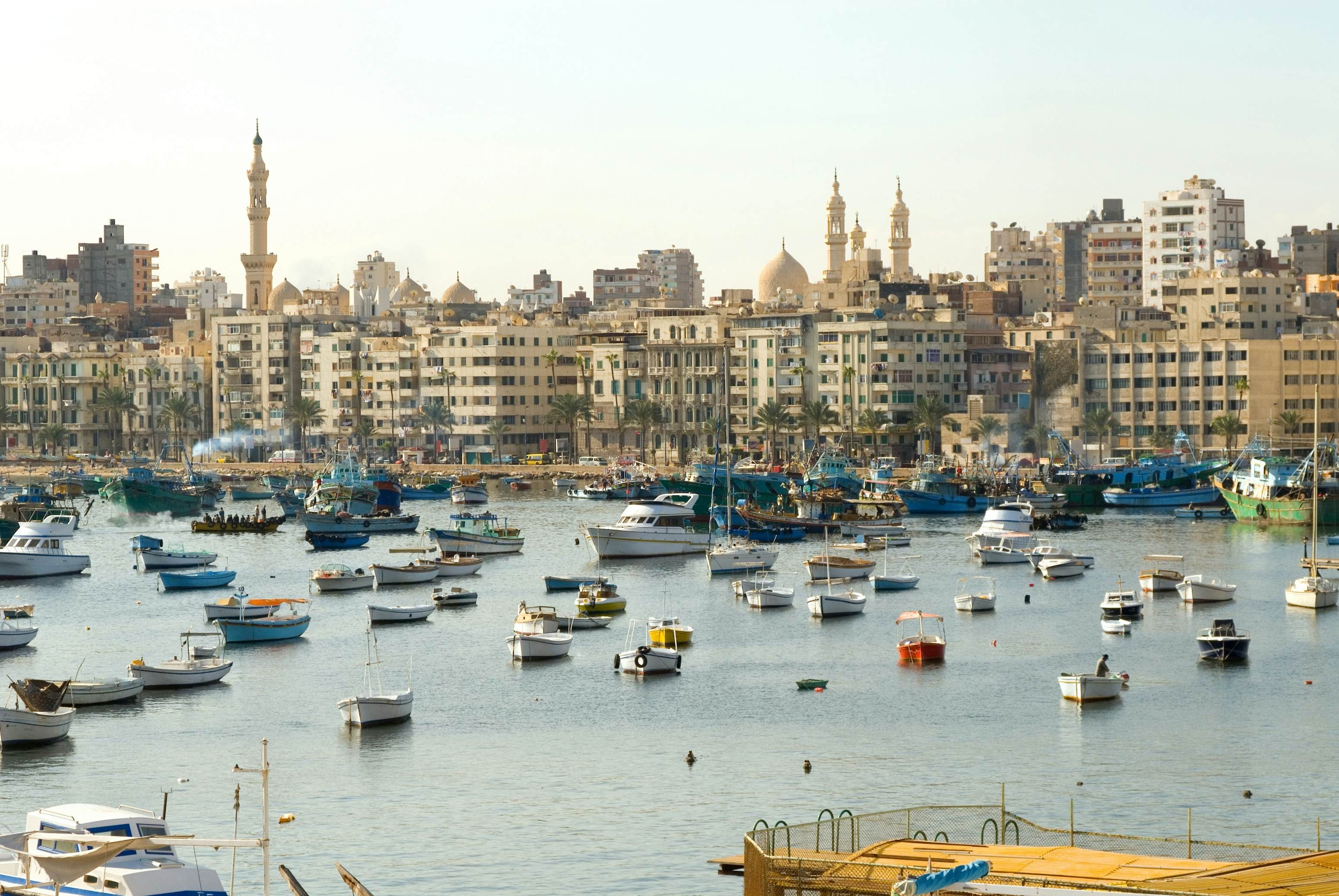 Boats resting on the Alexandria shoreline in Egypt