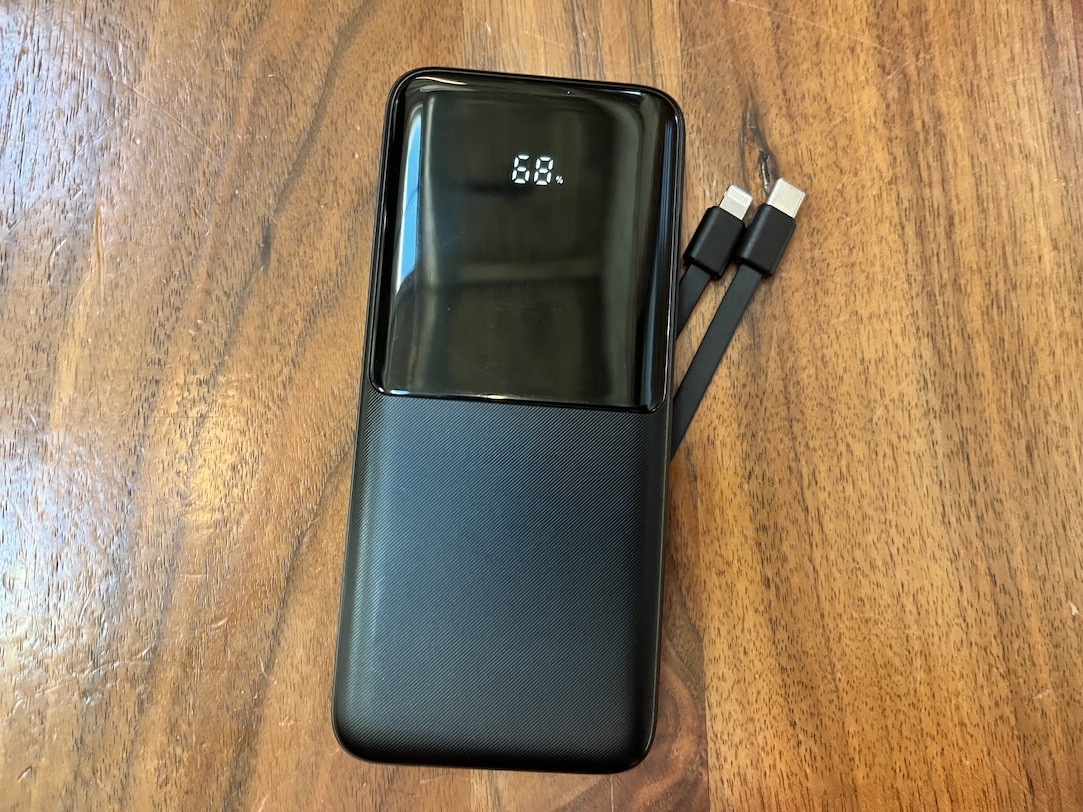 CFIAI Portable Charger Power Bank on a wooden surface.