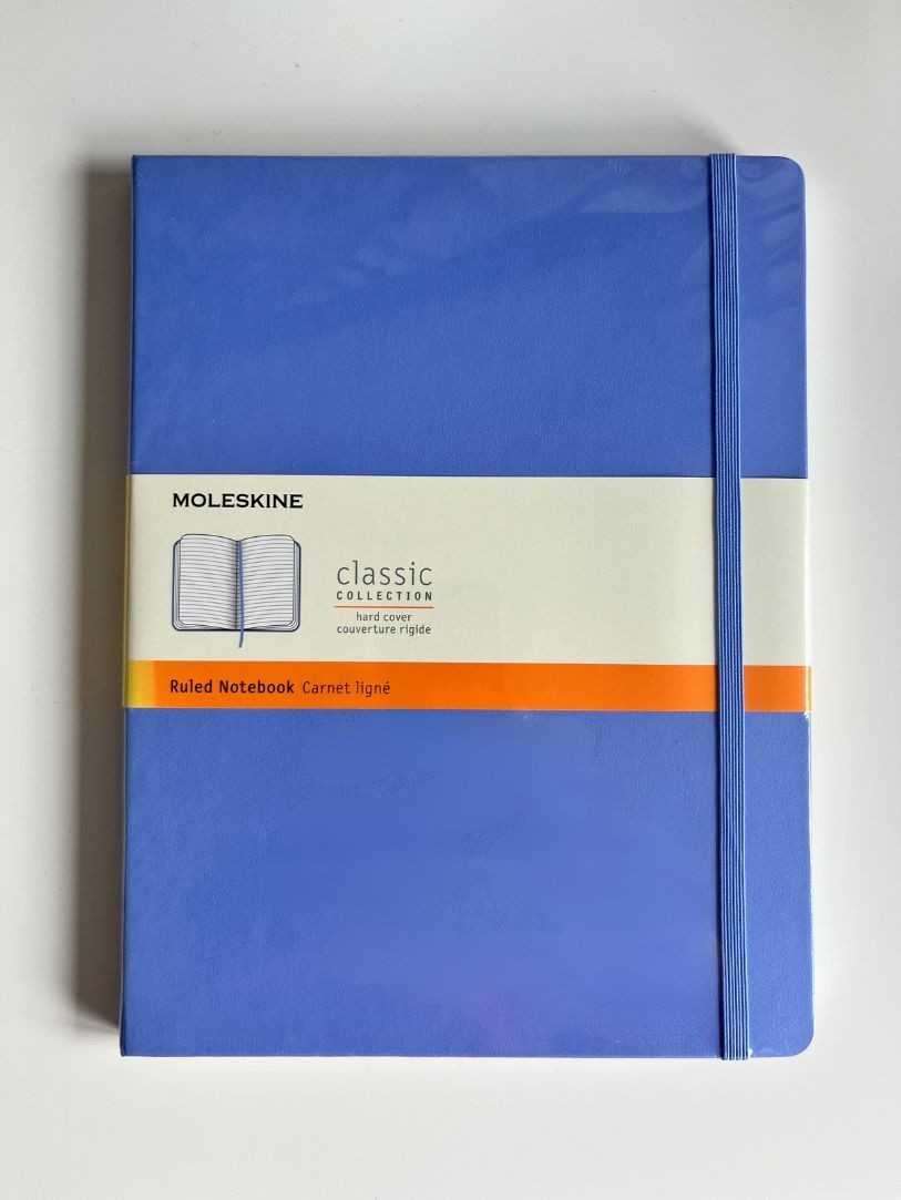 Moleskine Classic Notebook on a surface.